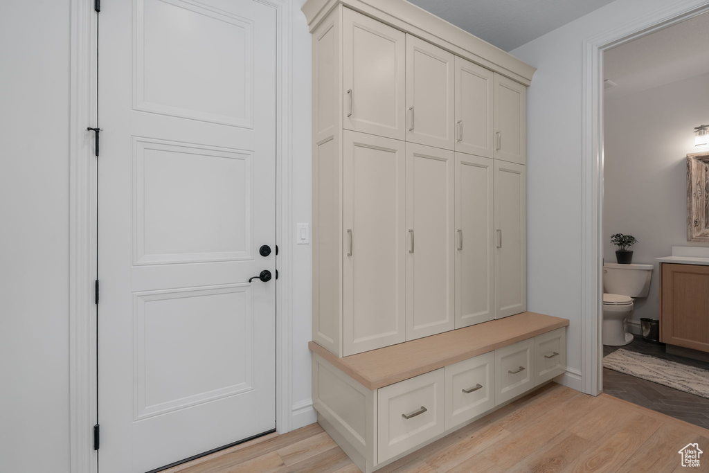 Mudroom featuring light wood-type flooring