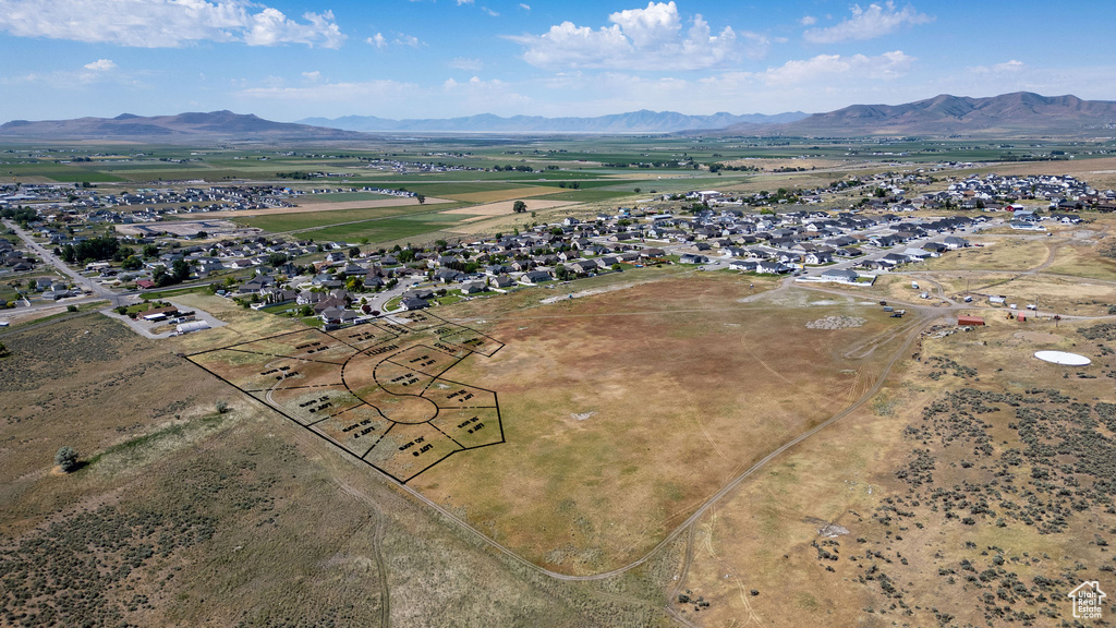 Aerial view of residential area with a mountain backdrop