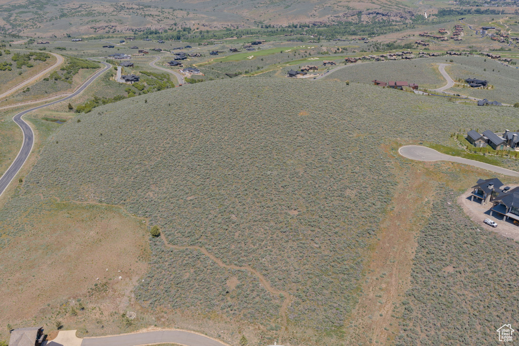 Aerial view of property and surrounding area with rural landscape