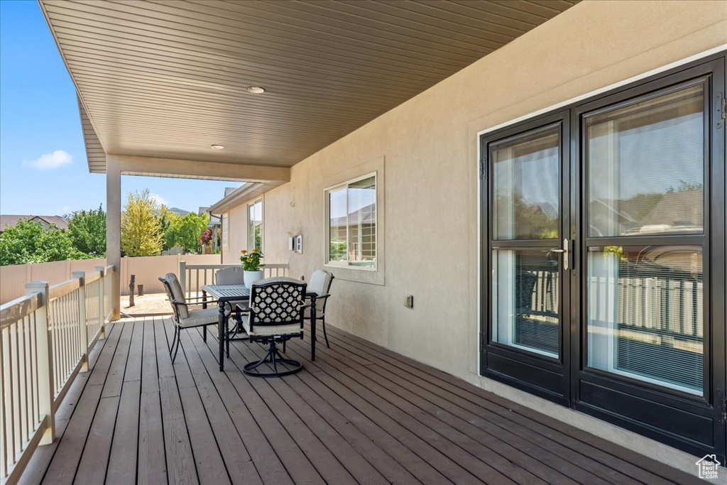 Wooden terrace with outdoor dining space