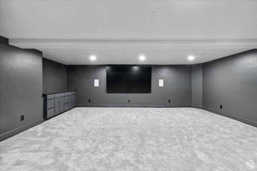 Finished below grade area with carpet and recessed lighting
