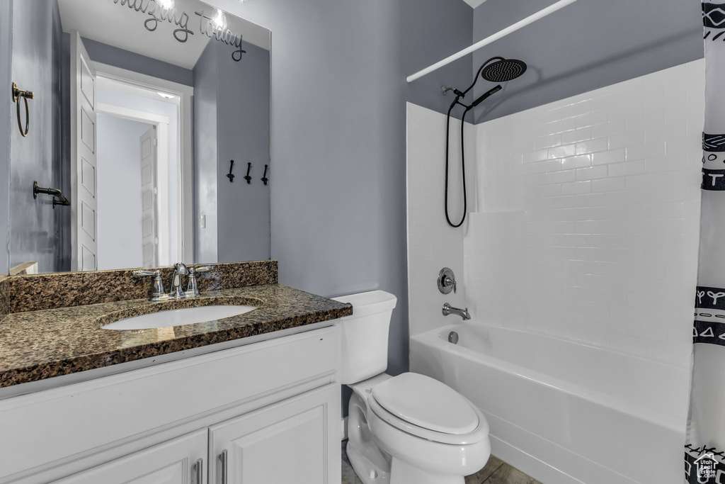 Full bathroom featuring shower / bathtub combination and vanity
