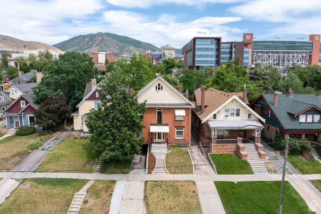 Aerial view of residential area with a mountain backdrop