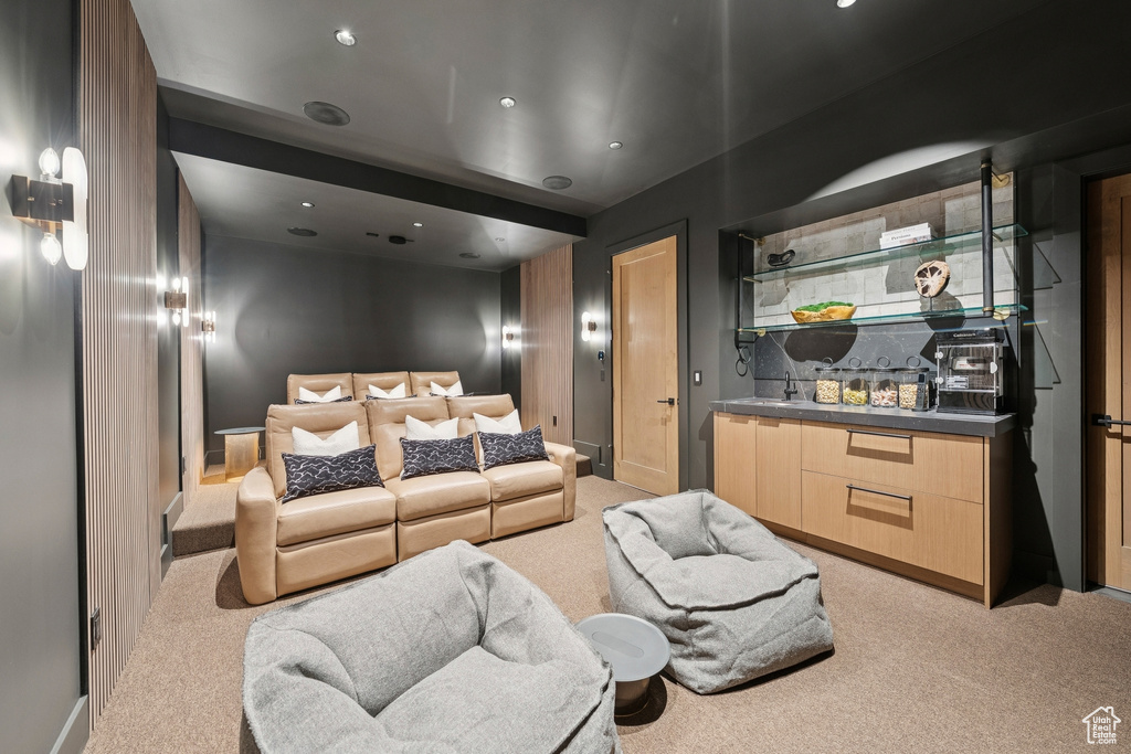 Cinema featuring light colored carpet and recessed lighting