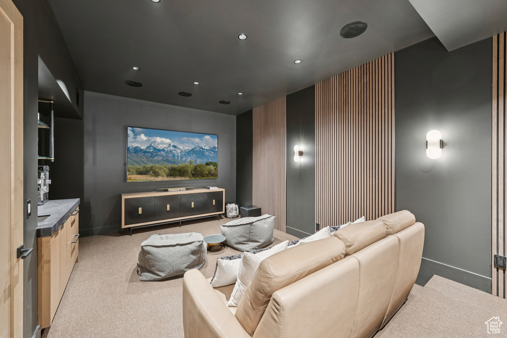 Cinema room with carpet floors and recessed lighting