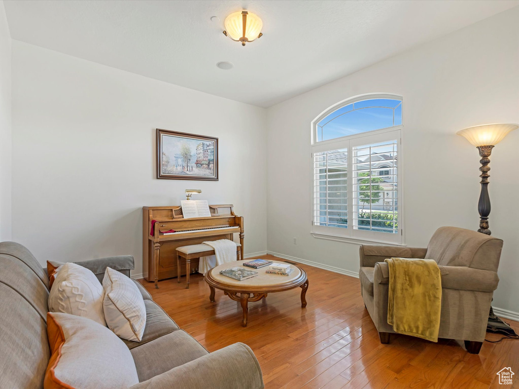 Living room with light wood-type flooring
