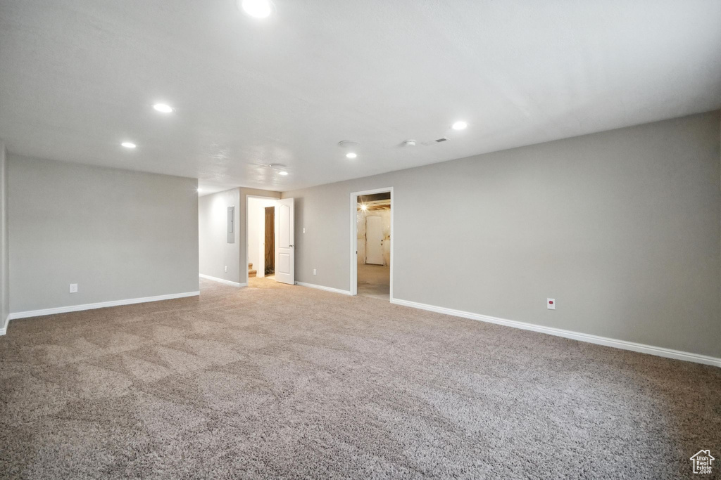 Spare room with recessed lighting and carpet flooring
