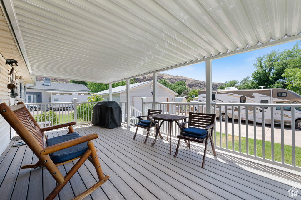 Wooden deck with a grill