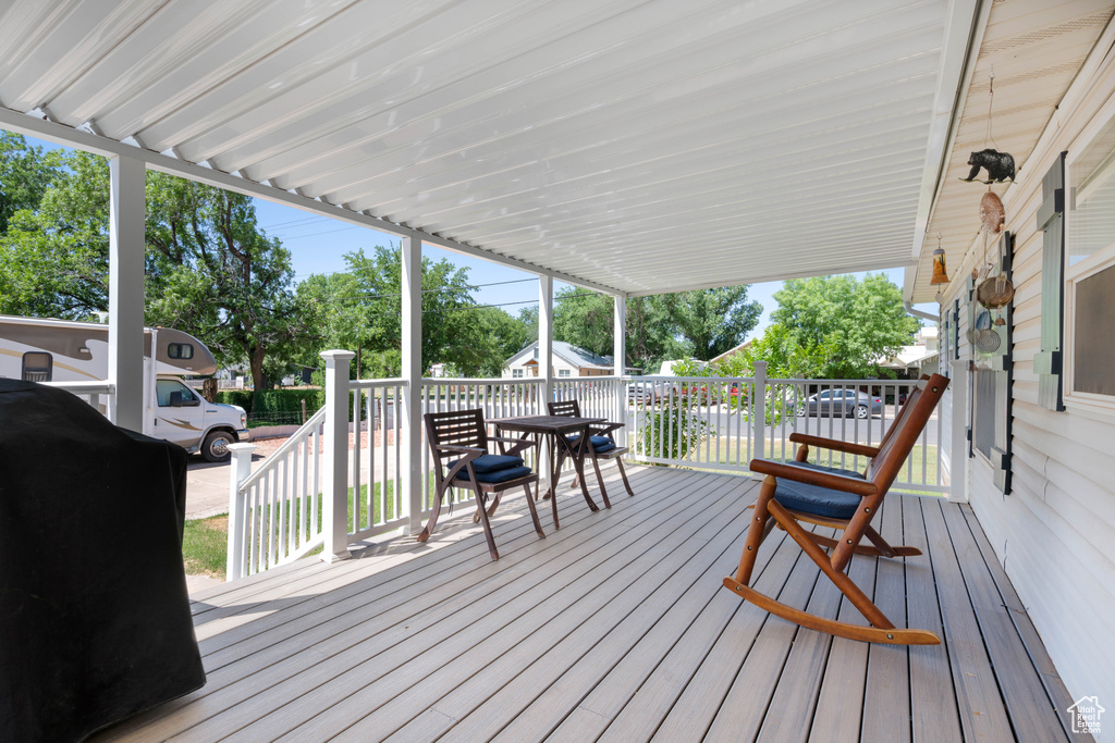 Wooden terrace with outdoor dining space