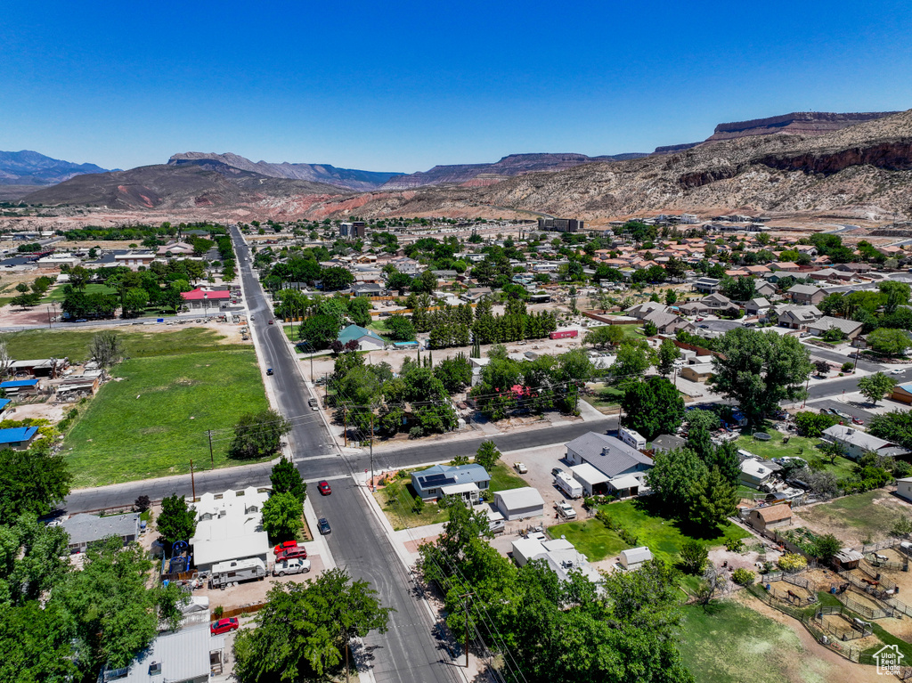 Aerial view of residential area with a mountainous background