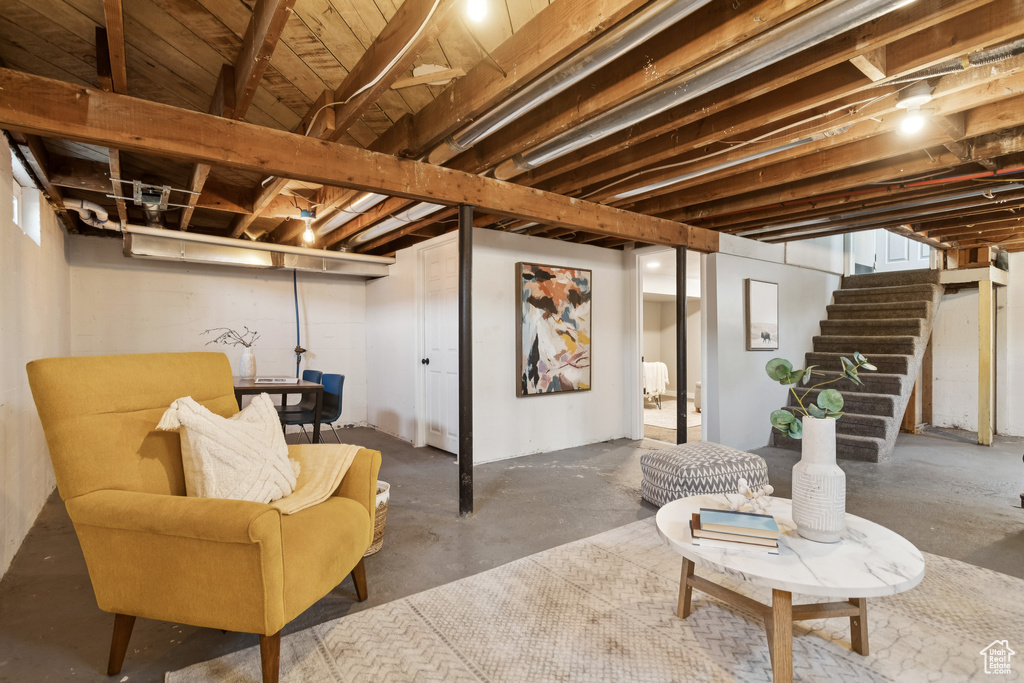 Basement featuring stairs