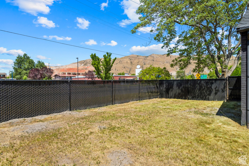 View of yard with a mountain view