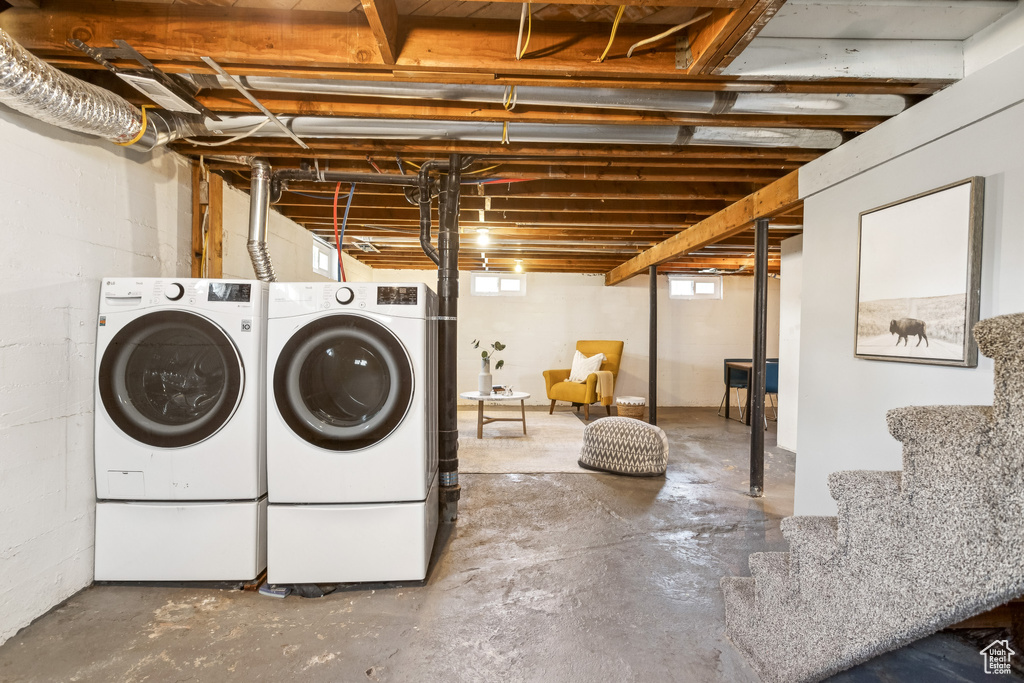 Below grade area with washer and dryer