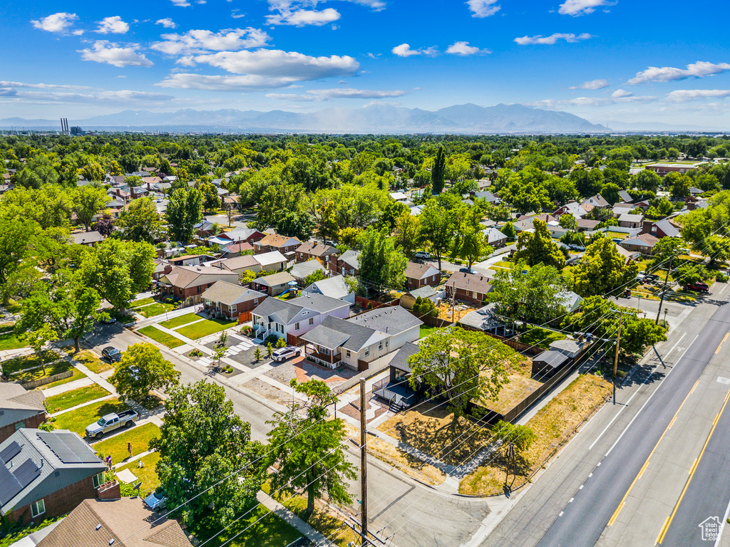 Aerial view of residential area with a mountain backdrop