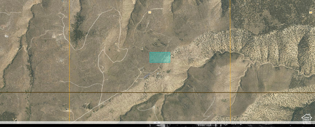 Aerial map of property and surrounding area featuring property parcel outlined