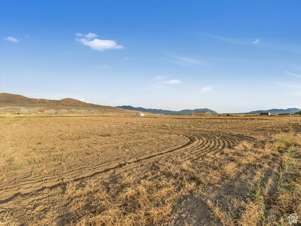 View of yard featuring a mountain view and a rural view