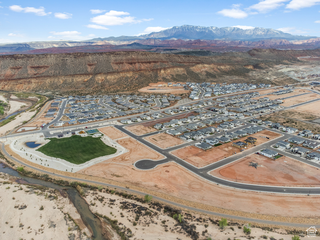 Aerial overview of property\'s location featuring a mountain backdrop