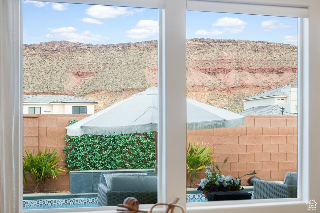 Doorway to outside with a mountain view