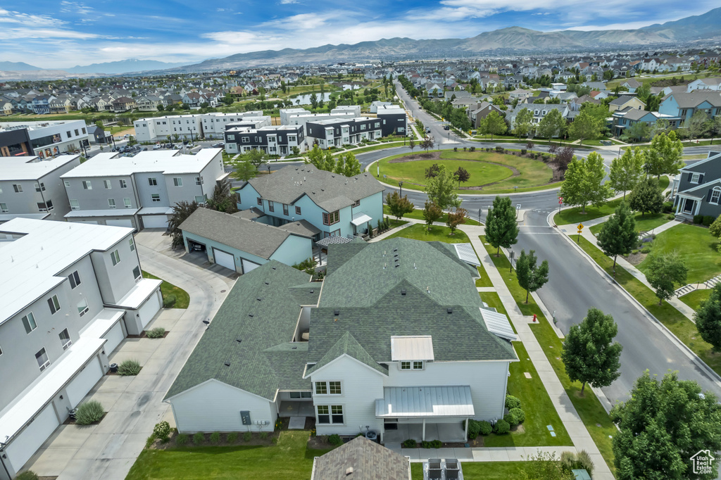 Aerial view of residential area with a mountain backdrop