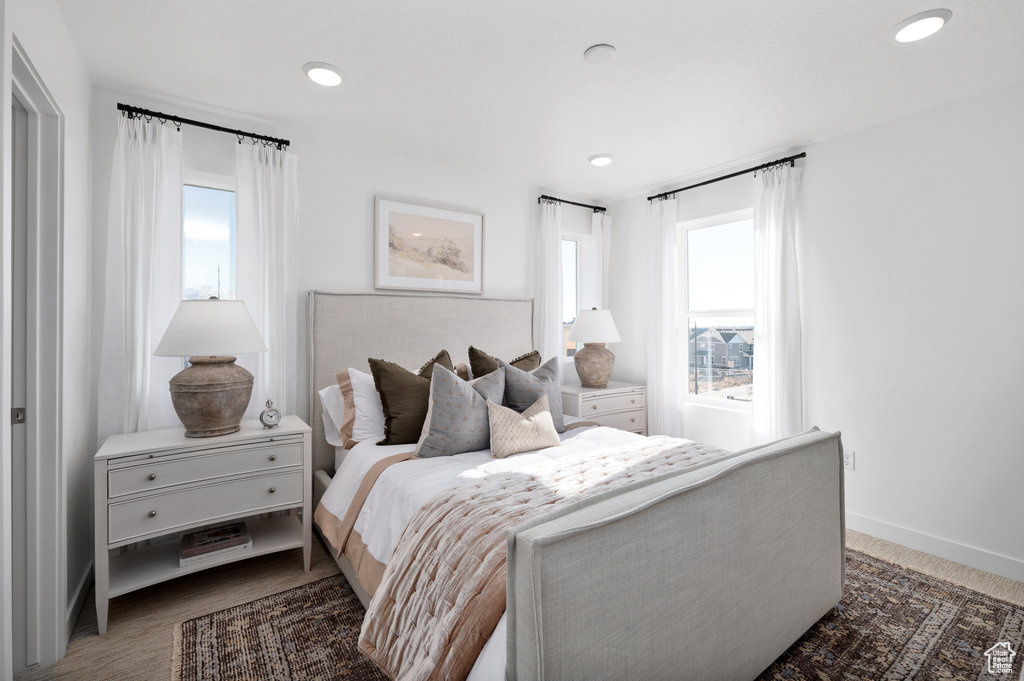 Bedroom with baseboards and recessed lighting