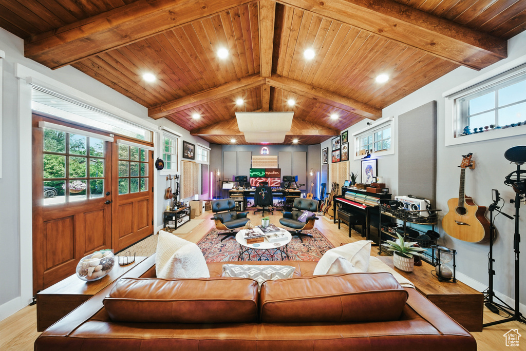 Living room with light wood-style flooring, wood ceiling, plenty of natural light, and recessed lighting