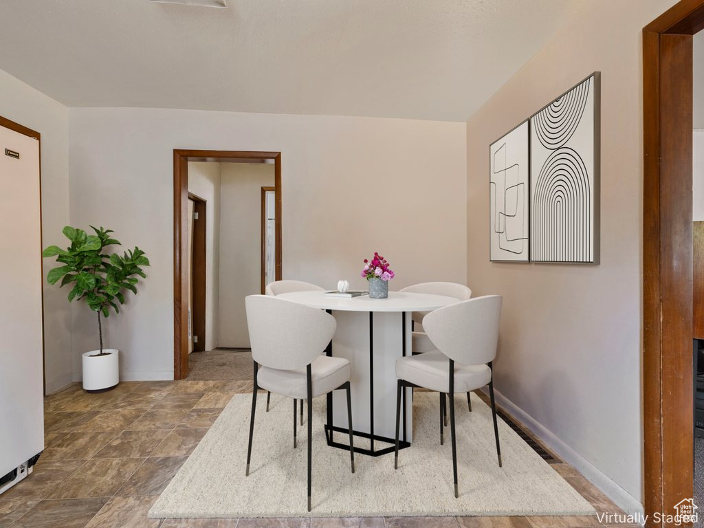 Dining room featuring baseboards