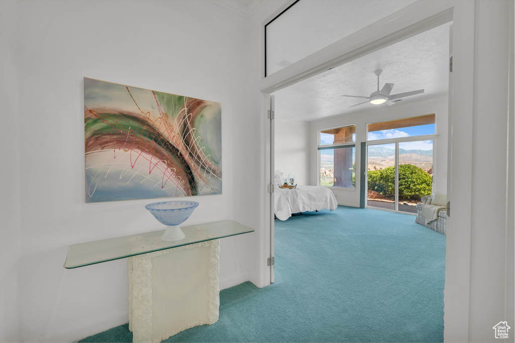 Bedroom with carpet and ceiling fan