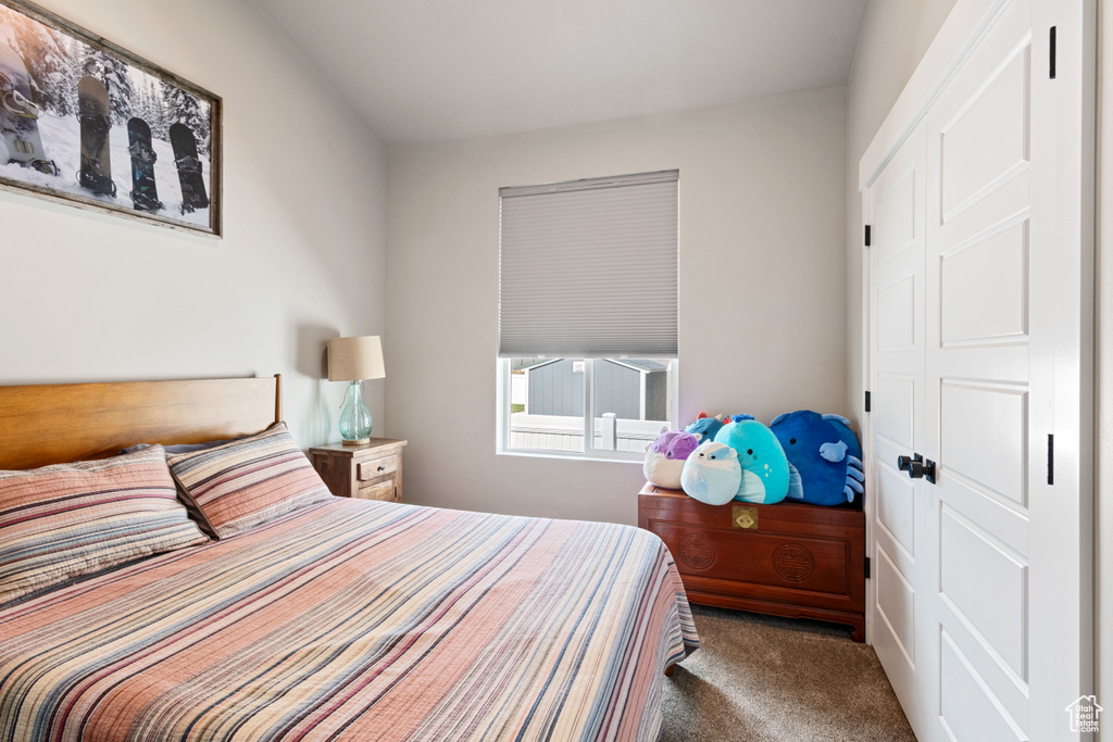 Bedroom with carpet flooring