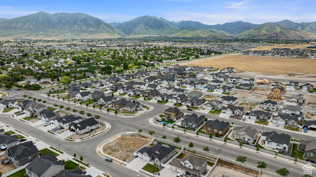 Aerial view of property\'s location with nearby suburban area
