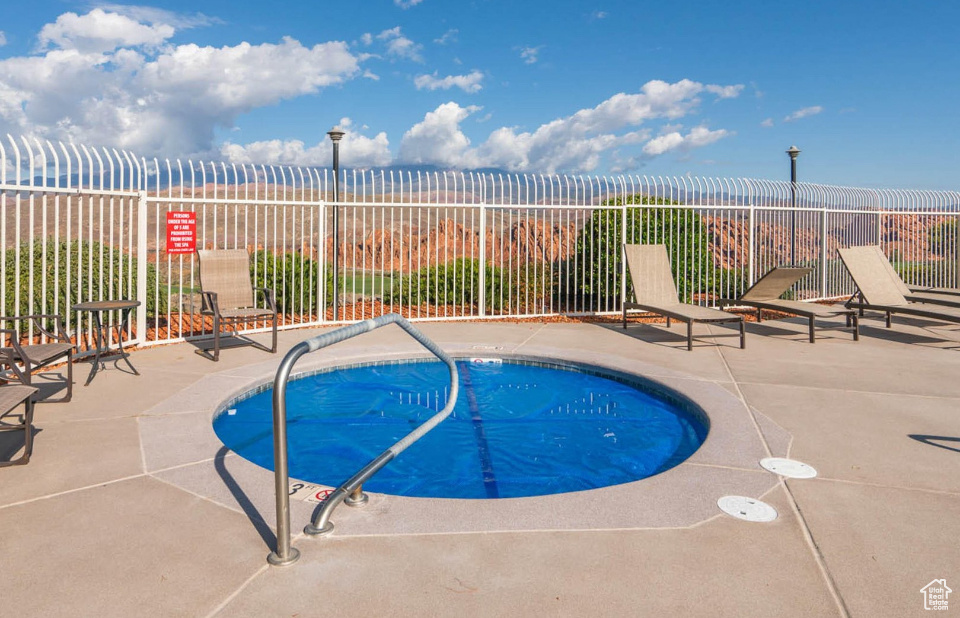 View of pool with a patio and a pool