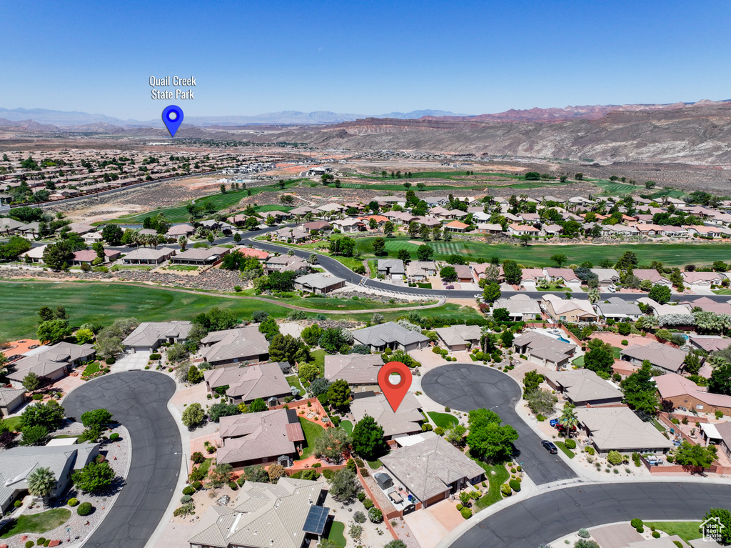 Aerial view of residential area with mountains