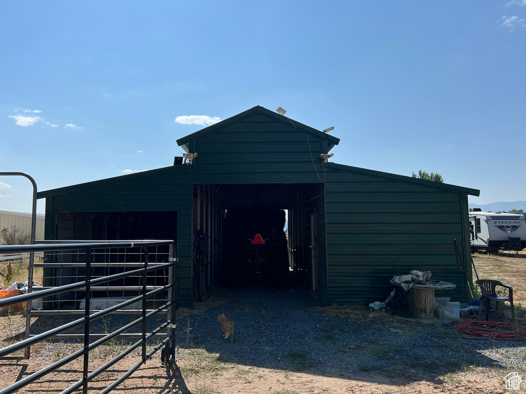 View of outbuilding with an exterior structure