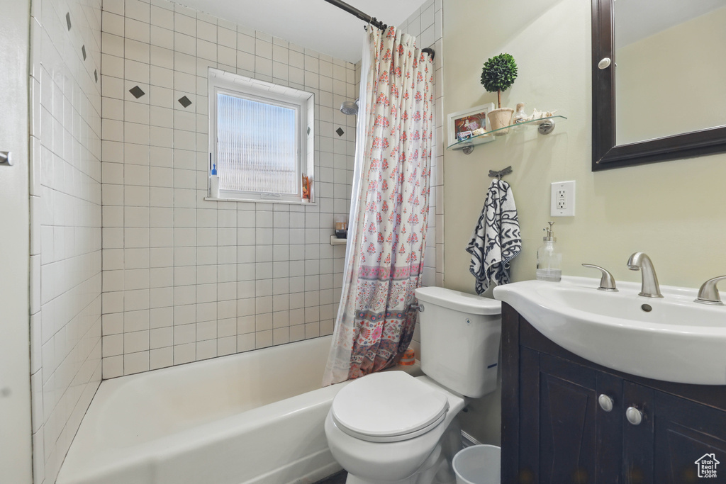 Full bathroom featuring vanity and shower / tub combo