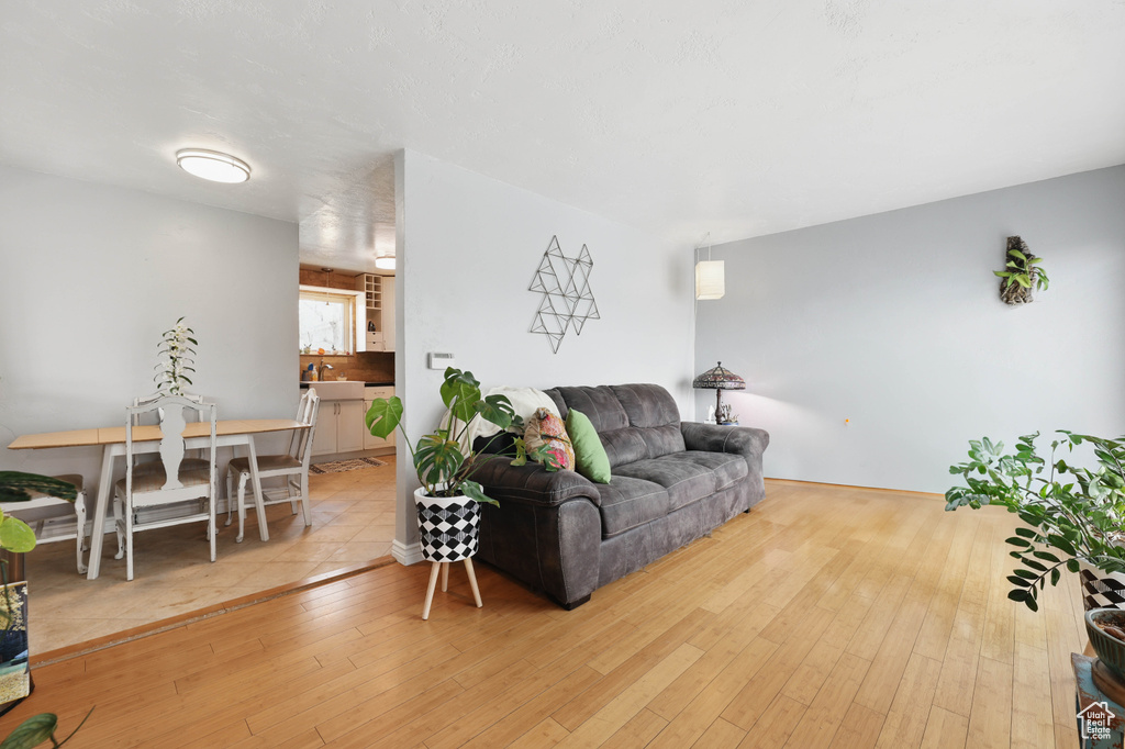 Living room with hardwood / wood-style floors