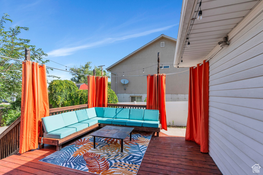 Wooden deck with outdoor lounge area