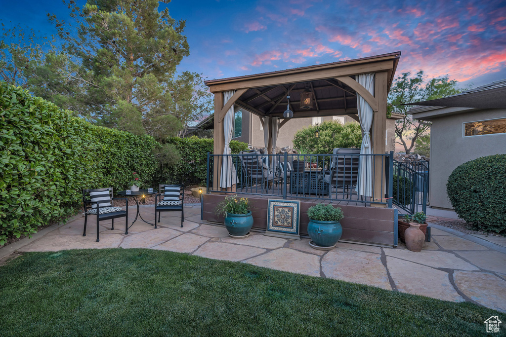 View of patio featuring a gazebo