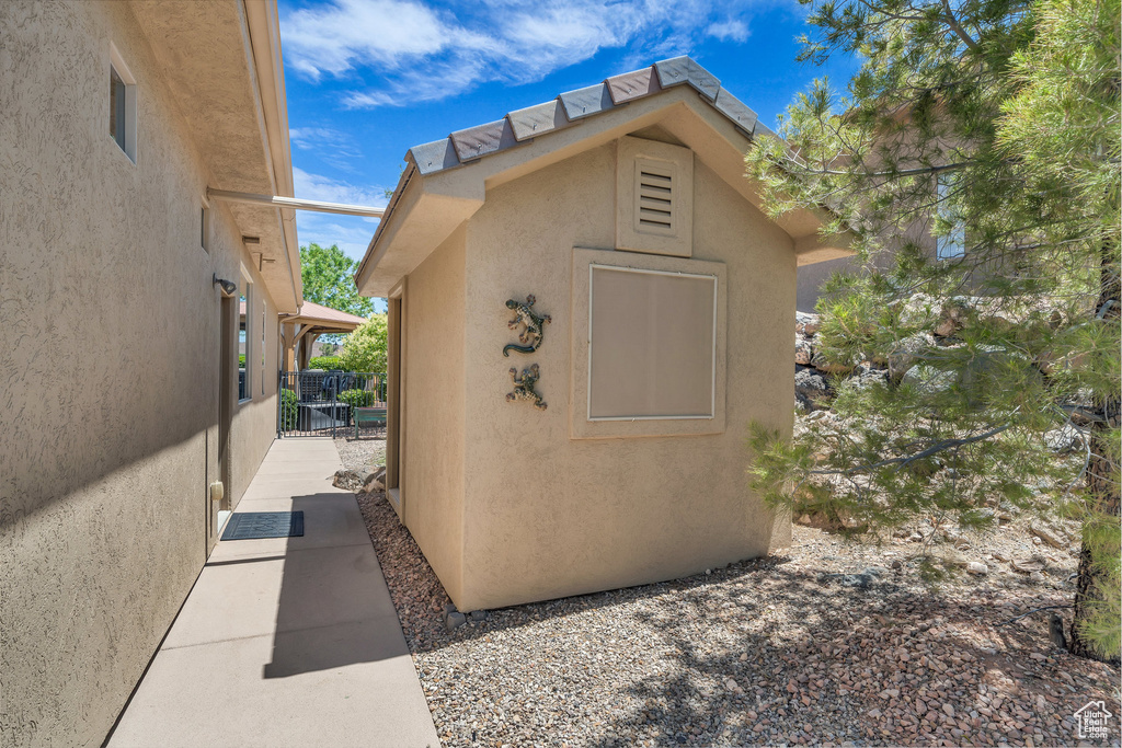 Property entrance with stucco siding