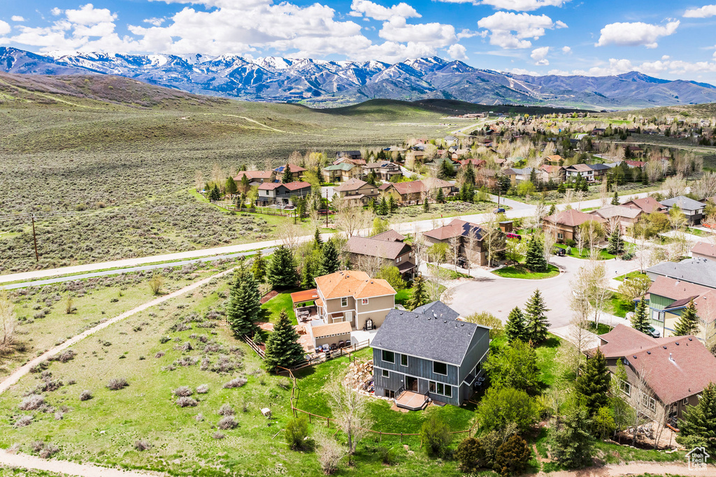 Aerial perspective of suburban area featuring mountains