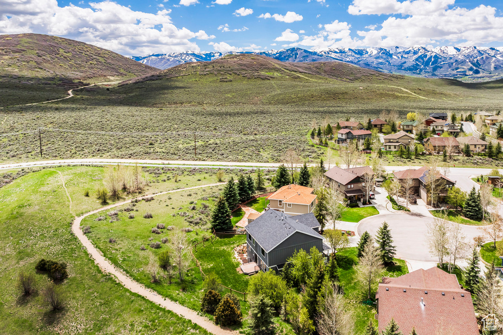 Aerial perspective of suburban area featuring mountains
