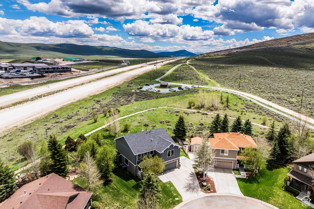 Aerial perspective of suburban area featuring mountains