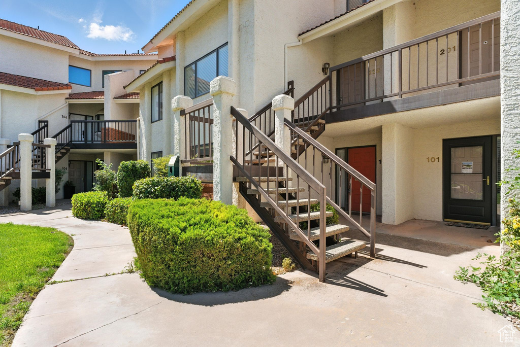View of building exterior featuring stairs