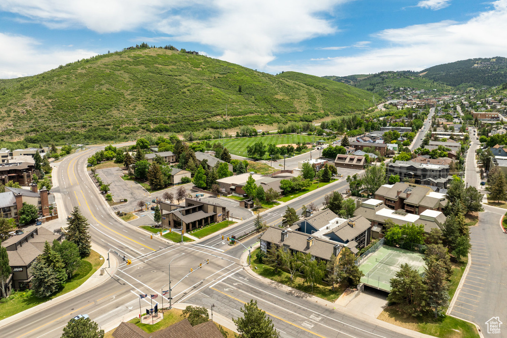 Aerial view of residential area with a mountain backdrop
