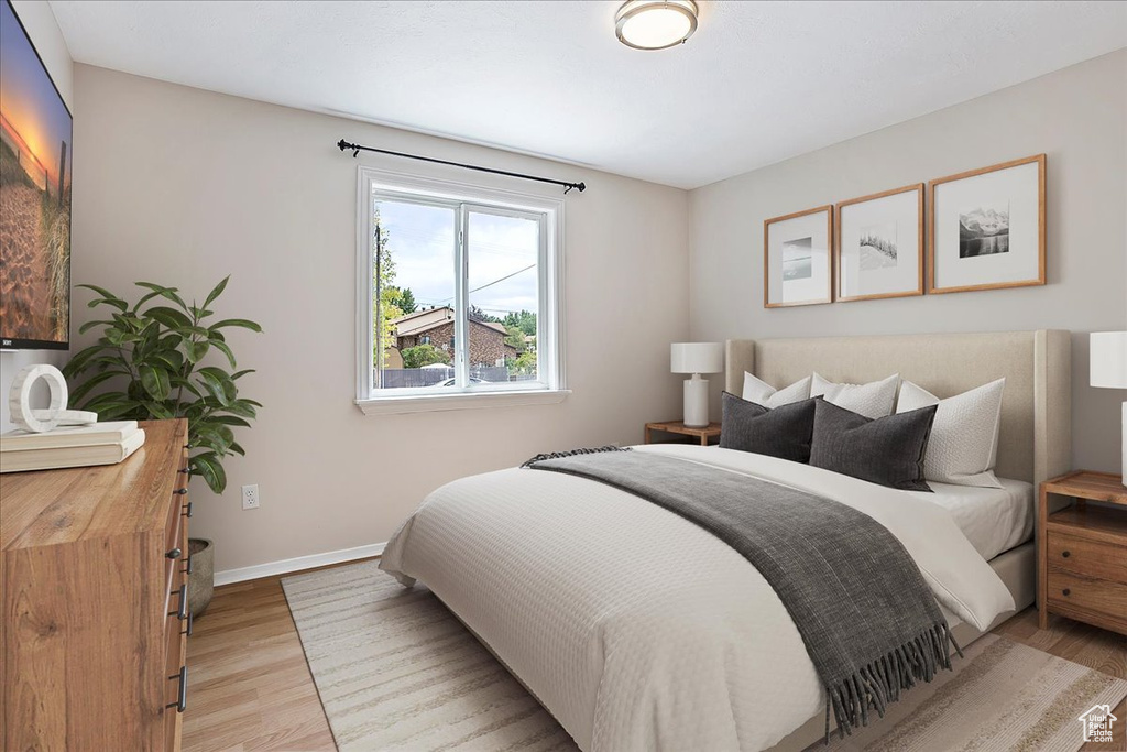 Bedroom featuring light wood-style flooring