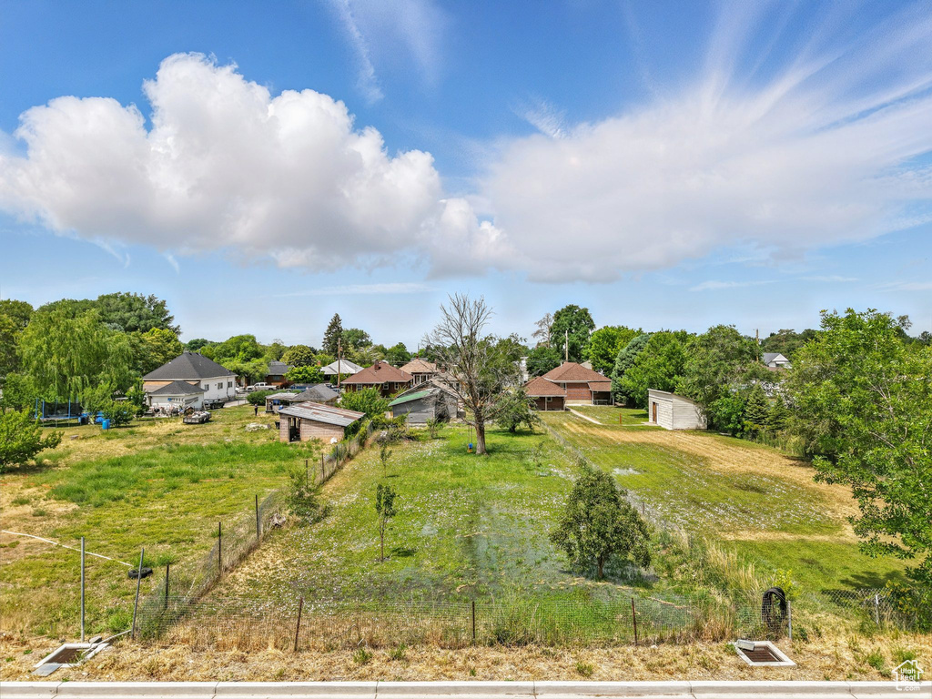 View of yard featuring view of scattered trees