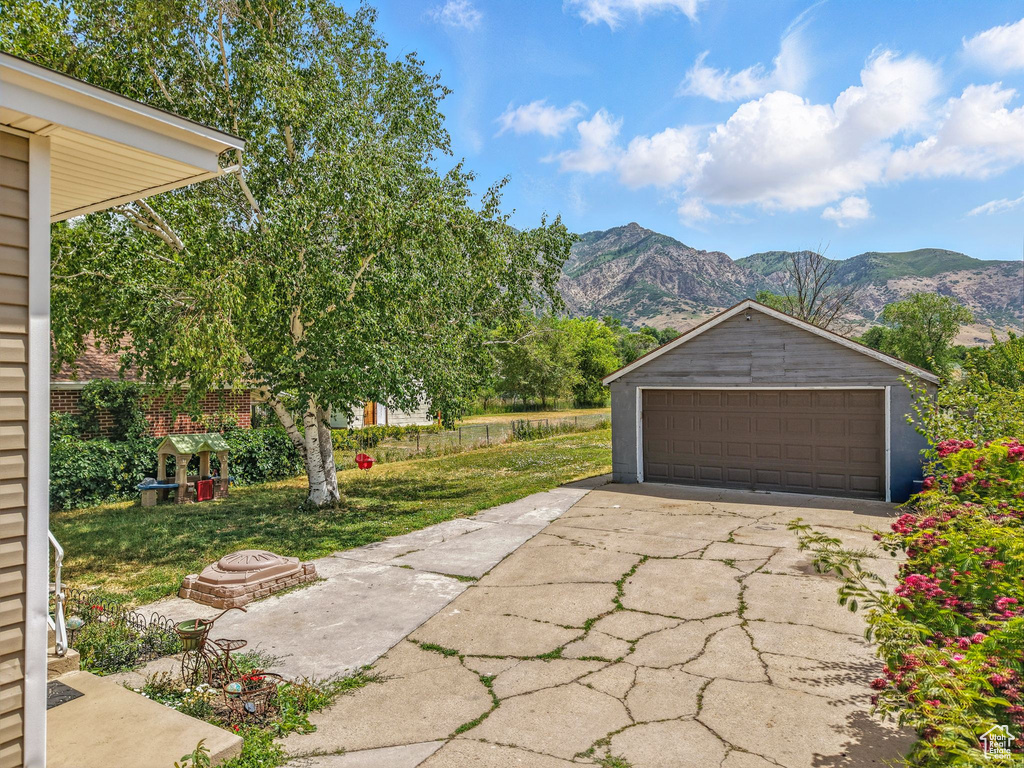 Detached garage with a mountain view