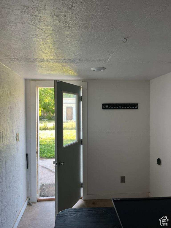 Entryway with a textured ceiling