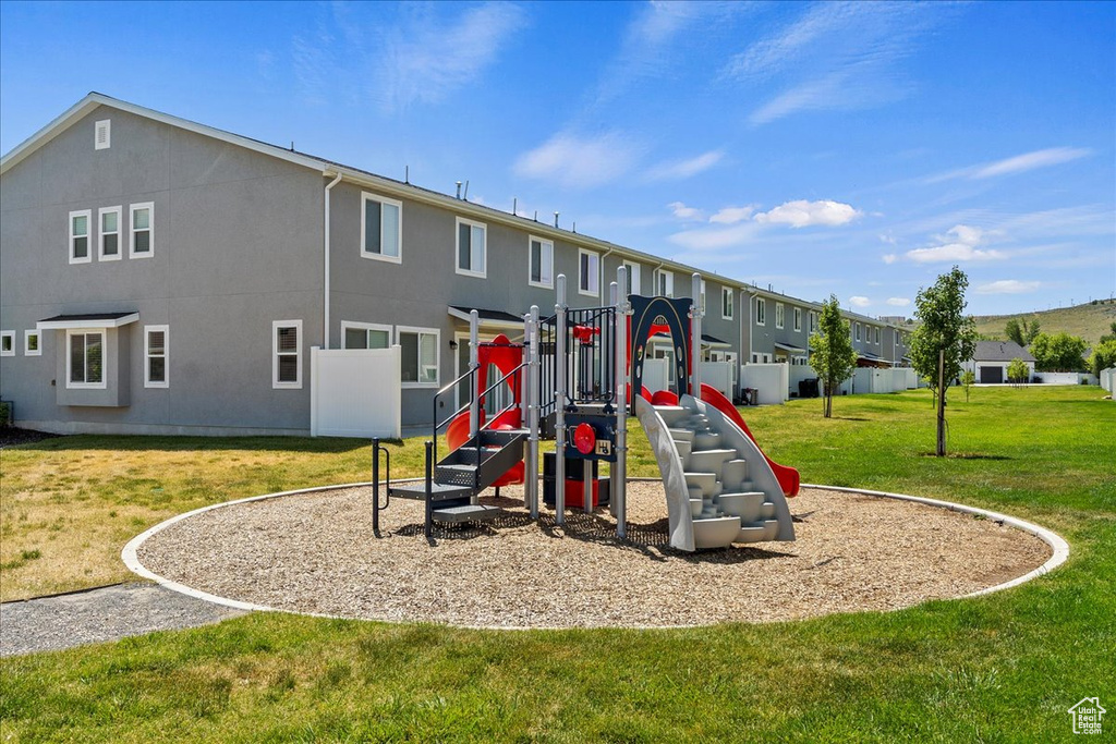 Community playground with a yard