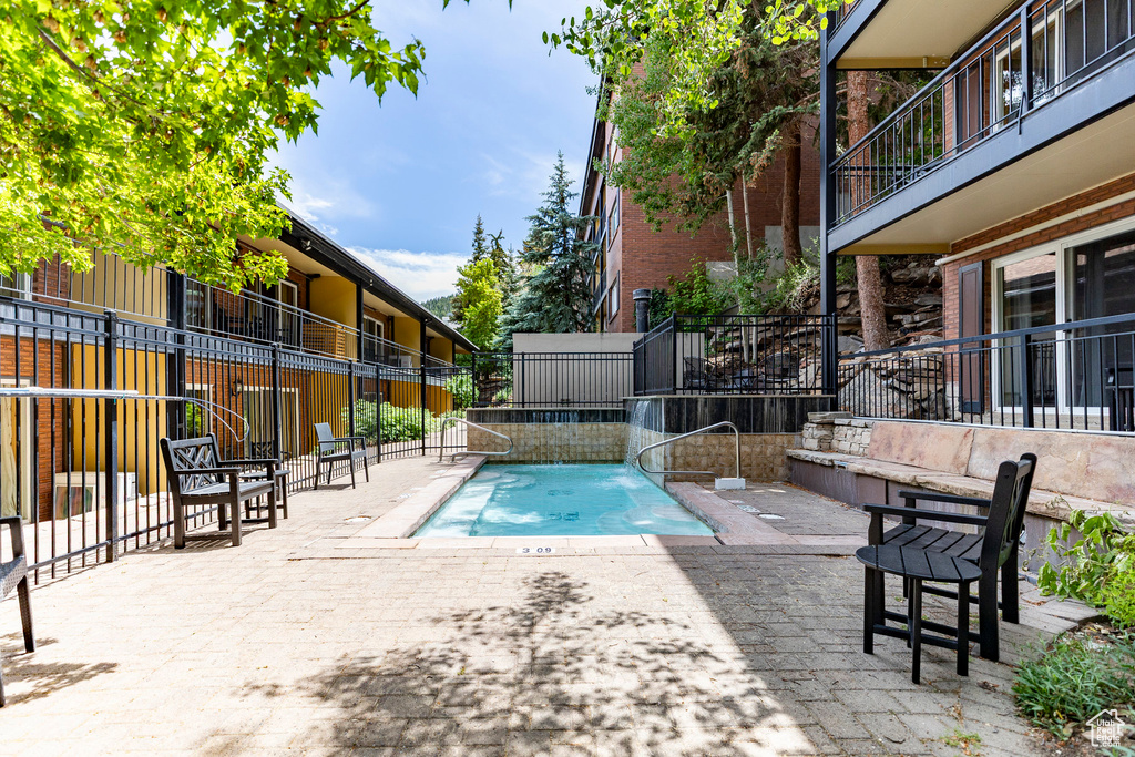 View of pool featuring a patio area and a pool