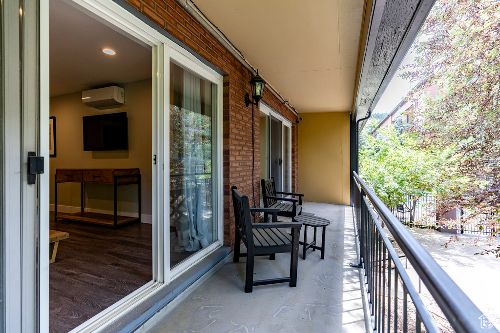 Balcony with an AC wall unit