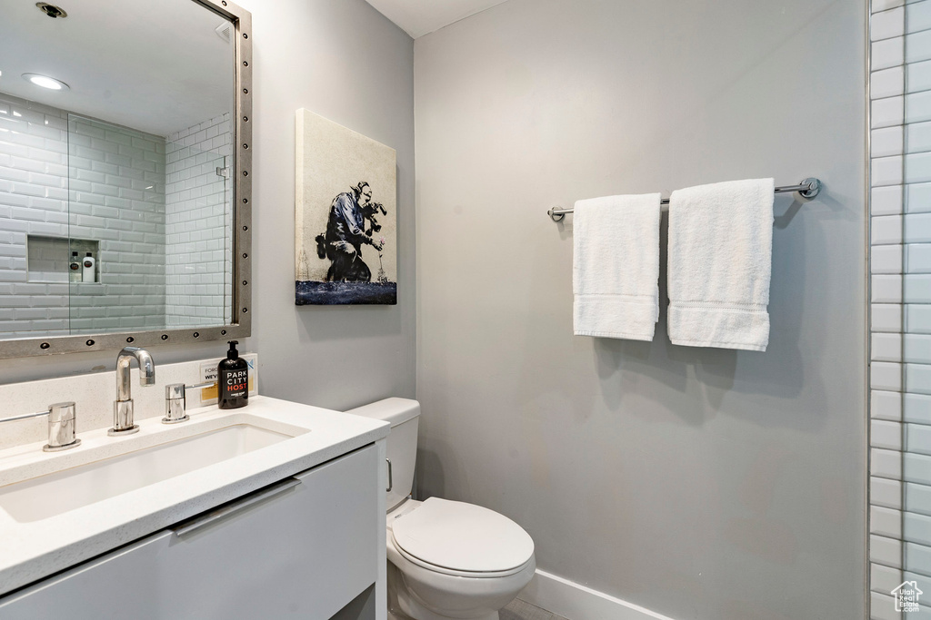 Bathroom with vanity and a shower